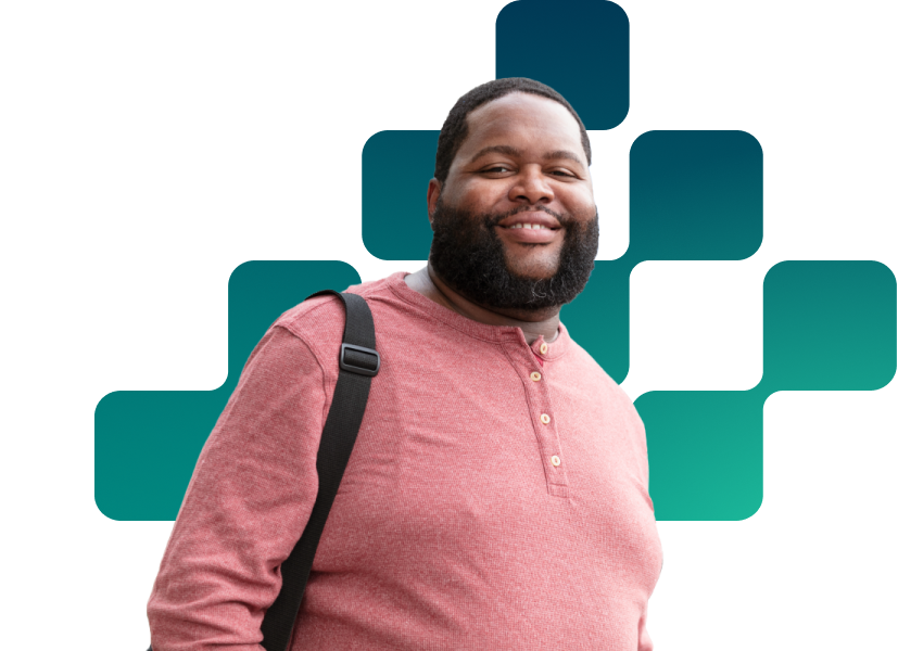 A man in a light red shirt